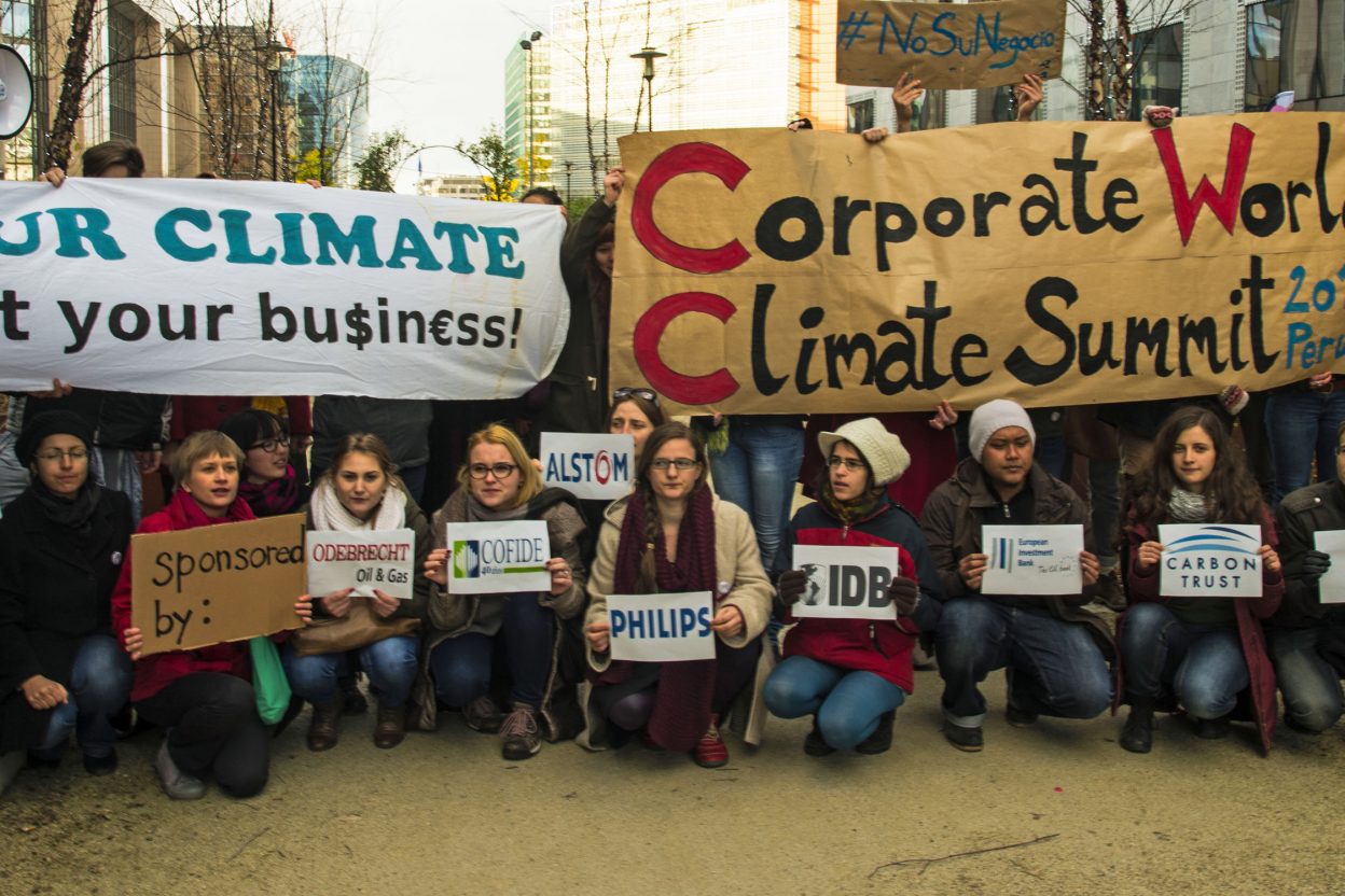 Calling for an end to corporate involvement in climate talks (c) YFoEE