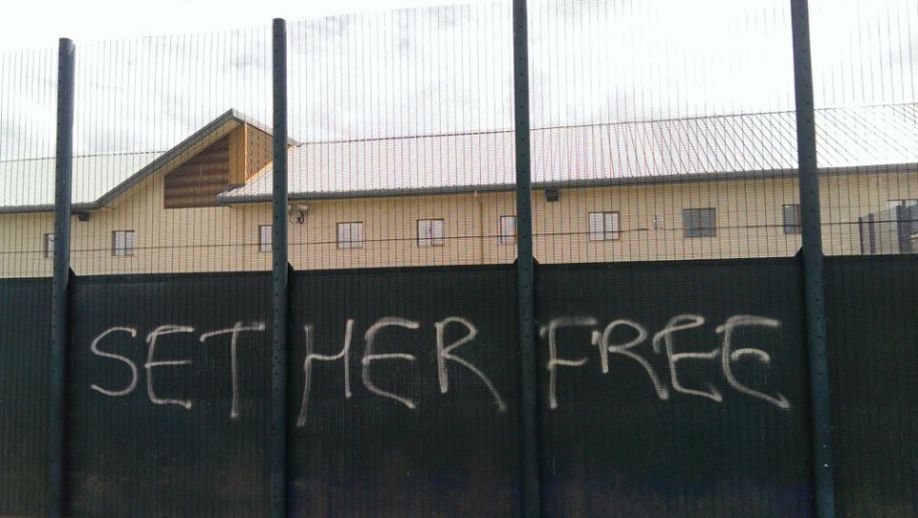 "Set her free" written on the Yarl's Wood Fence